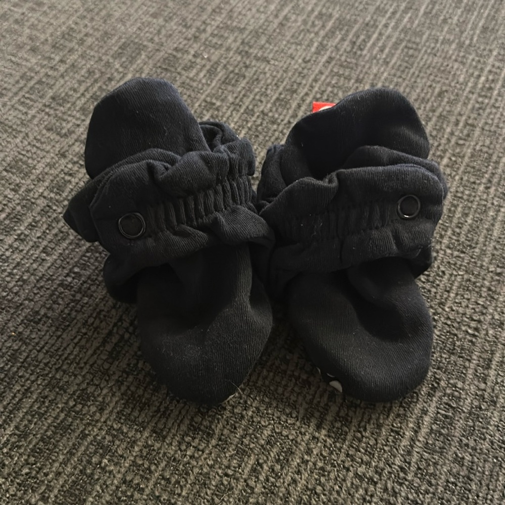Zutano booties for babies with snap closure. Like new